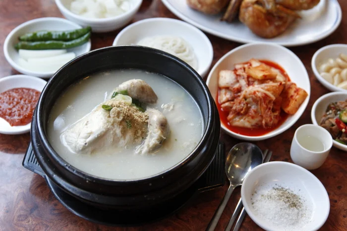 Korean culture - Samgyetang (ginseng chicken soup) in Korean food in movies representing shared national identity and healing.