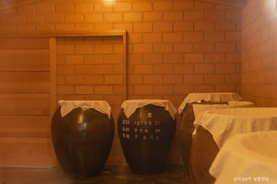 Korean culture - Traditional Makgeolli (rice wine) in Korean food in movies representing the spirit of Han and resilience.