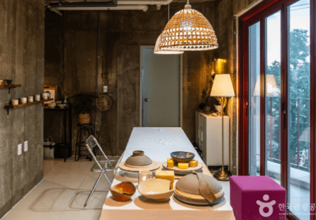 Cozy and welcoming atmosphere of a Korean guest house, showcasing the warm sentiment of 'Jeong'.