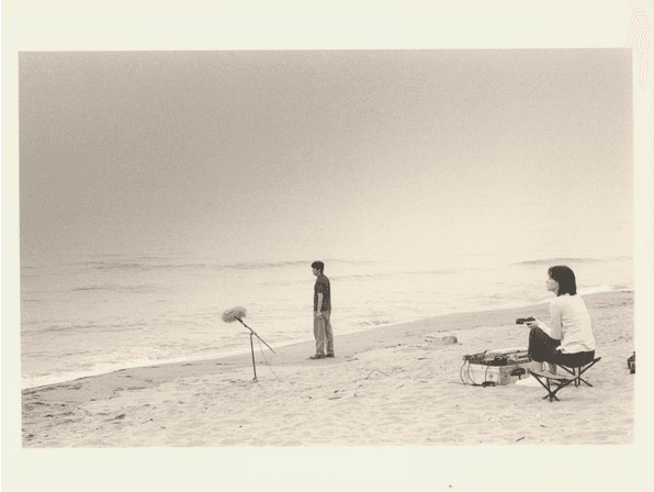 Movie still of Sang-woo and Eun-su sharing a quiet, intimate moment in a traditional Korean setting - One Fine Spring Day